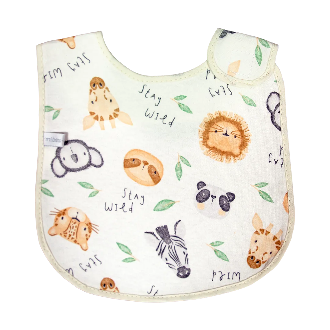 1002660 - Babero mediano con abrojo lateral, dorso laminado "Interlock Motivos Surtidos".
